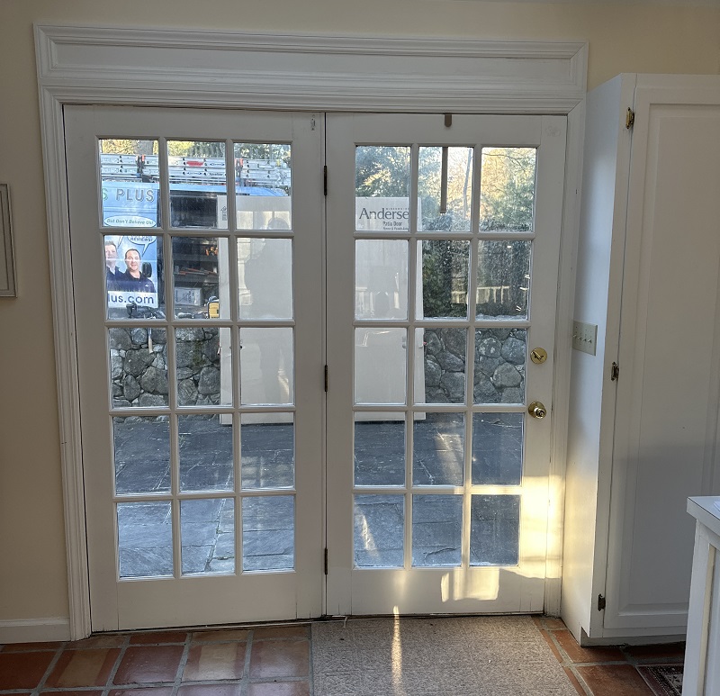 Wood french door with single pane glass has poor operation